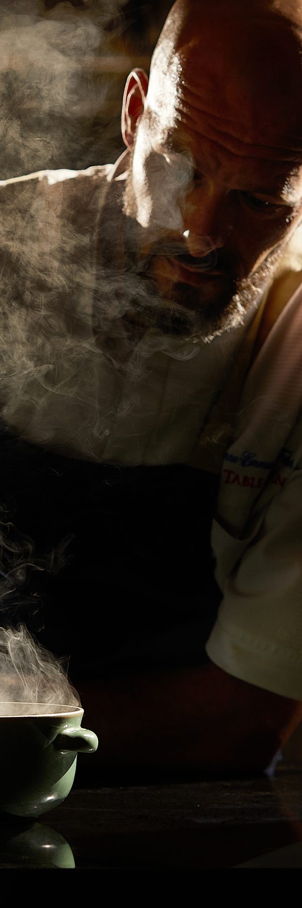 Chef Pierre-Emmanuel Fritsch over a steaming pot